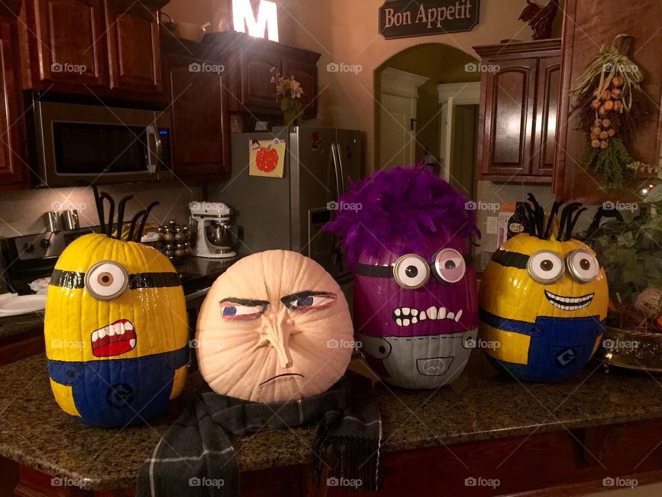 Halloween pumpkins in the likeness of Minions...and Gru
