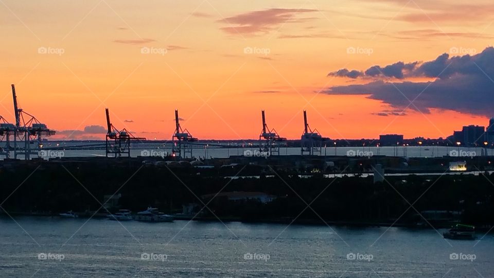 Sunset over Dodge island Miami Florida..This is where the container ships load and unload products