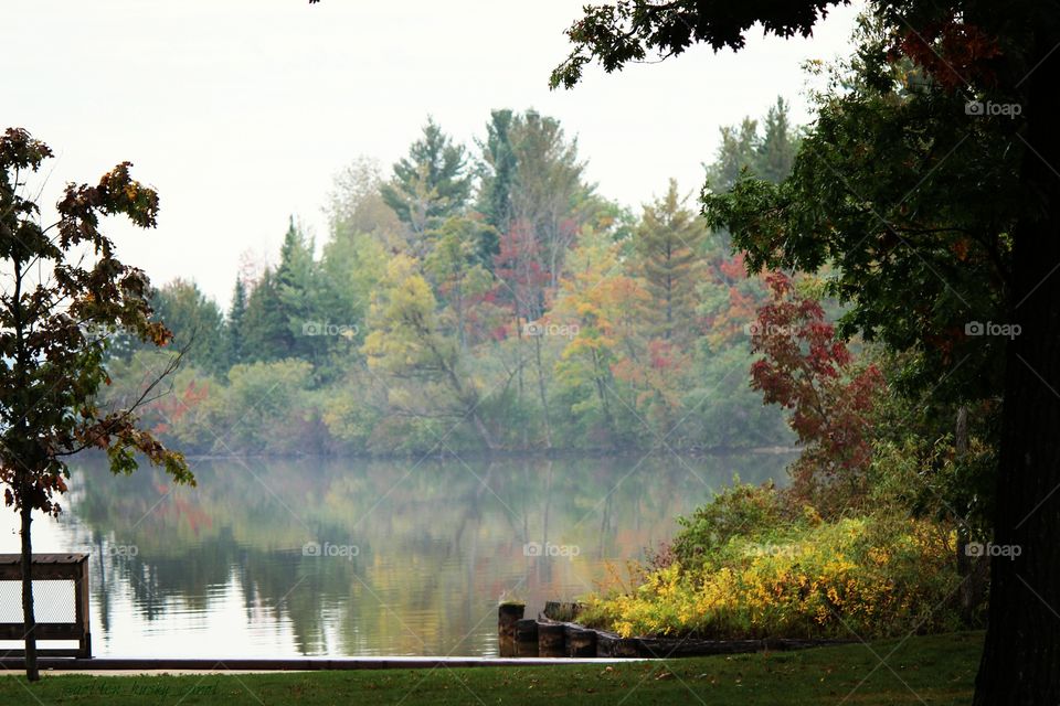 into the forest by the lake we go to view the tremendous color and tranquility of the lake and reflection of fall