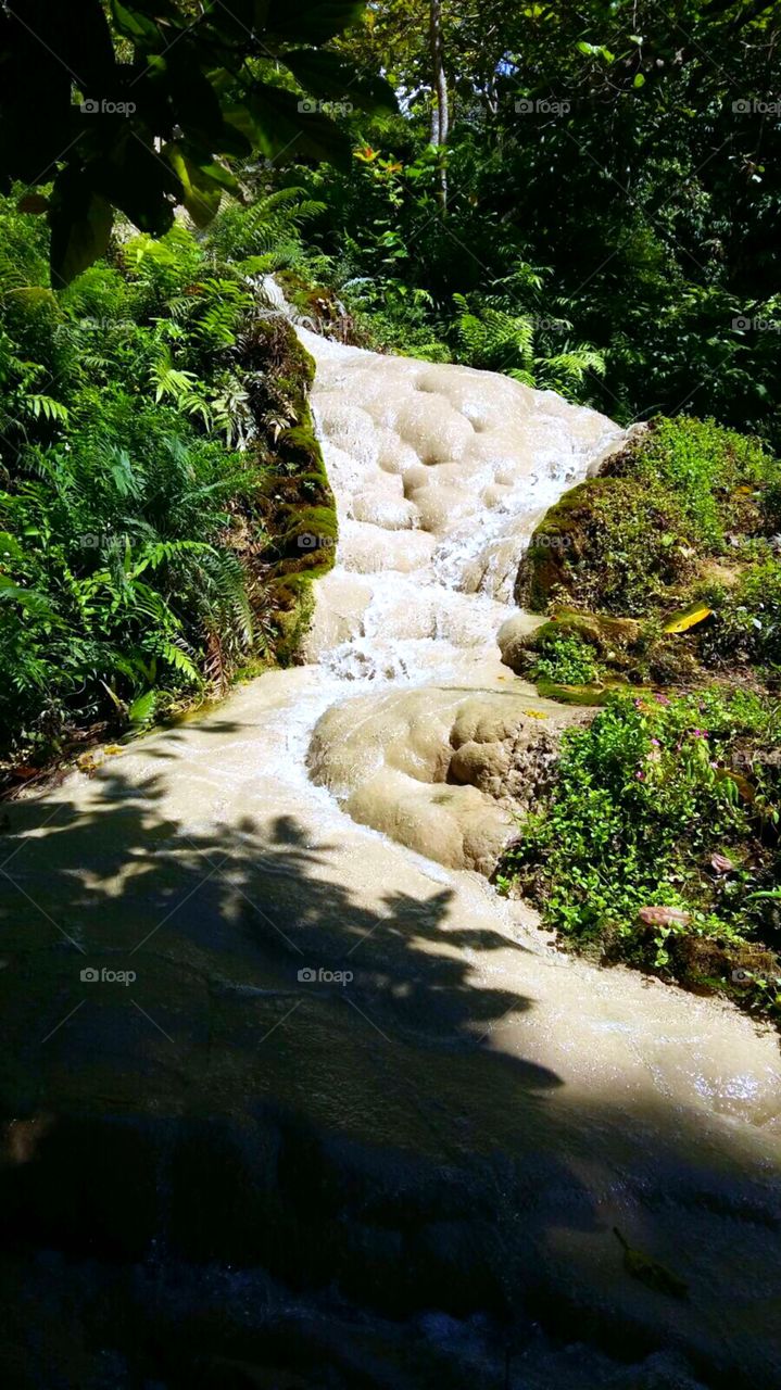 Bua Tong Waterfall, Chiang Mai. White streambed made of limestone