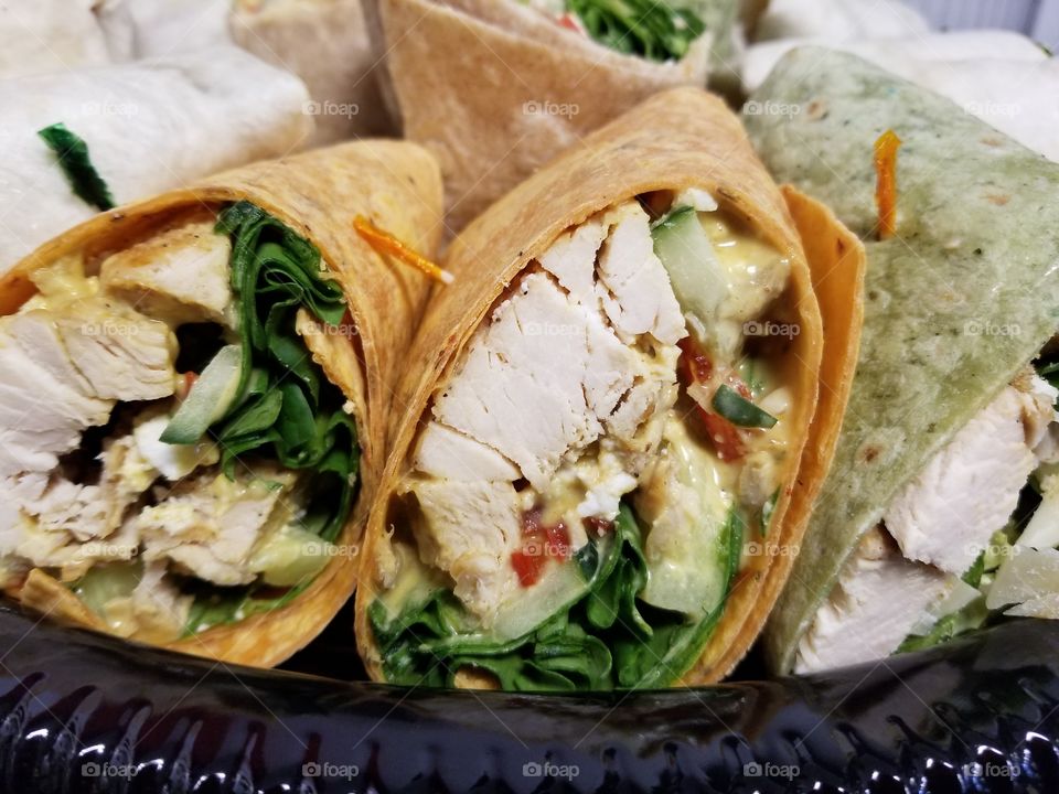 chicken, spinach, peppedew pepper greatness surrounded by a roasted tomato hug.