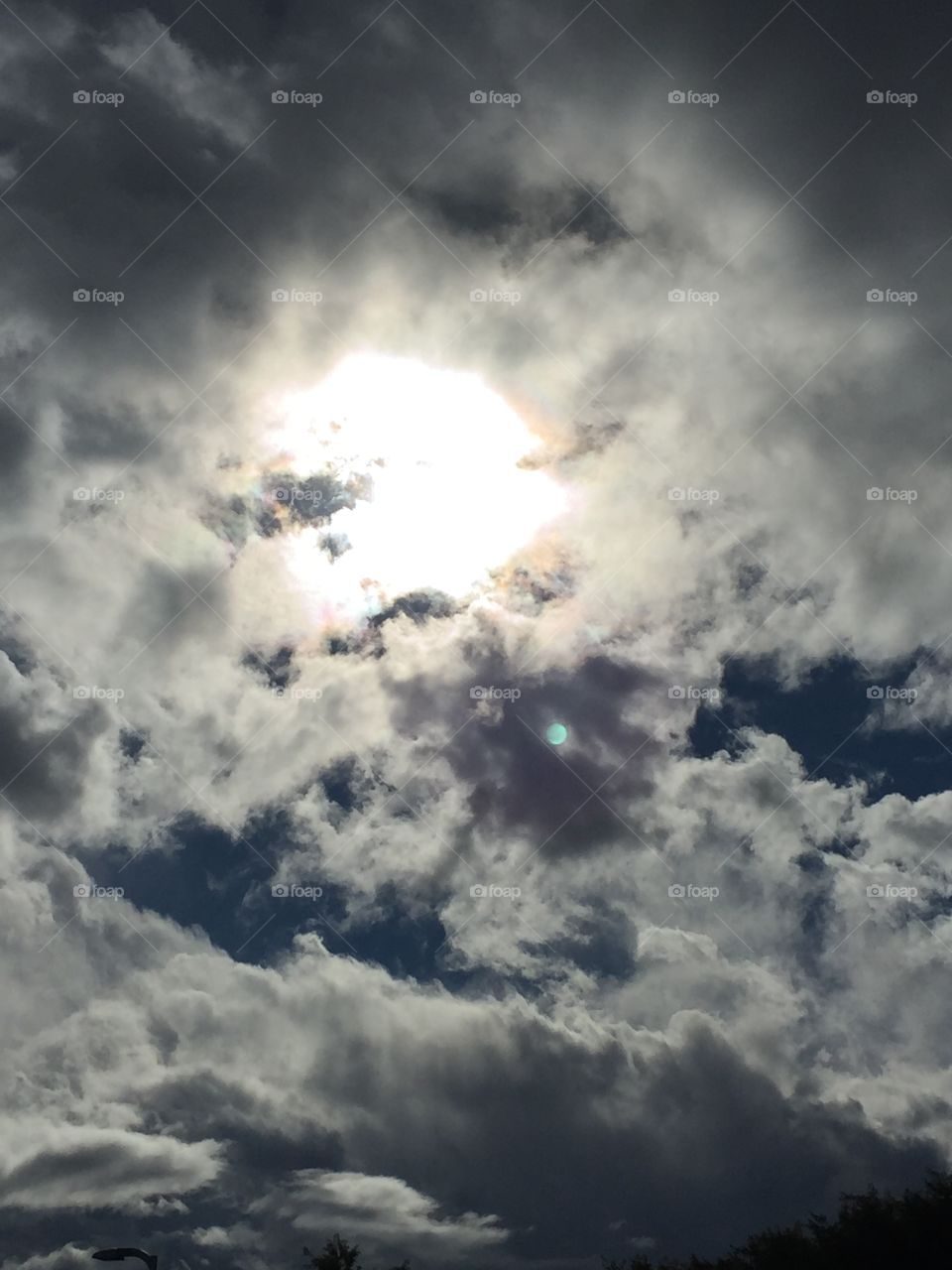 sun peeking through the clouds 