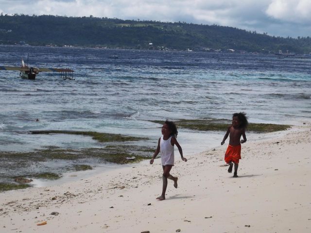 The kids felt sad for their moms went to fish and leave them at the coastal