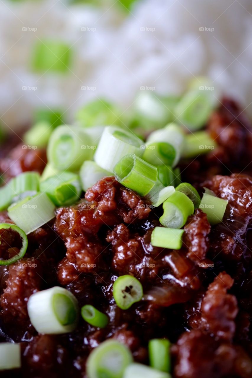 Korean Beef Bowl With Rice And Green Onions 