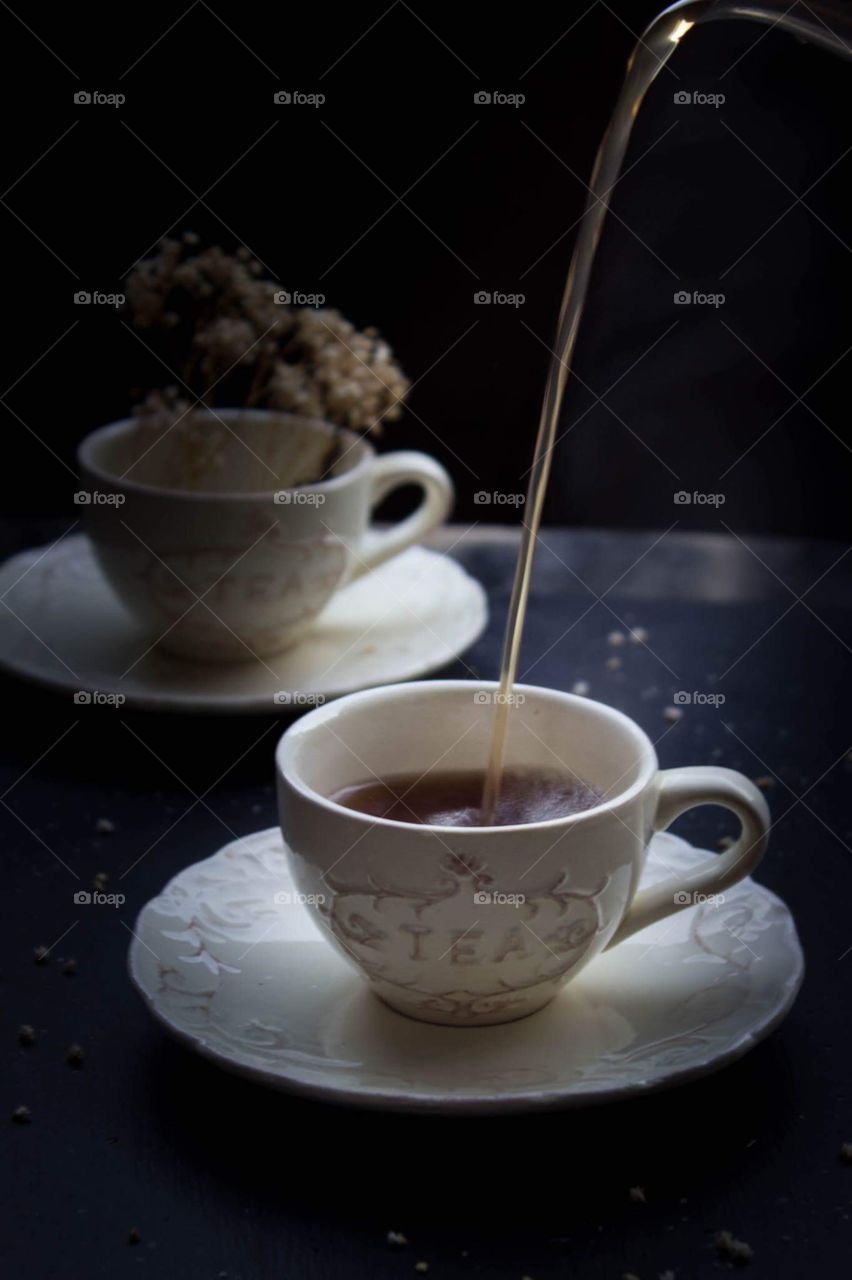 Hot tea pouring 