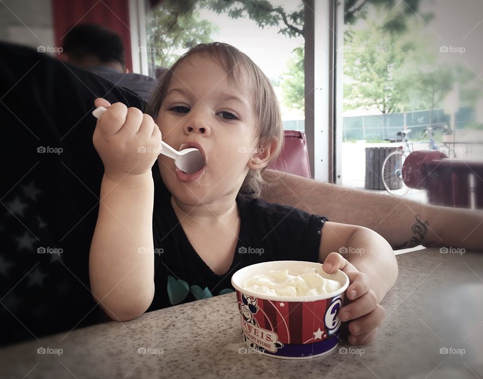 Toddler eating ice cream