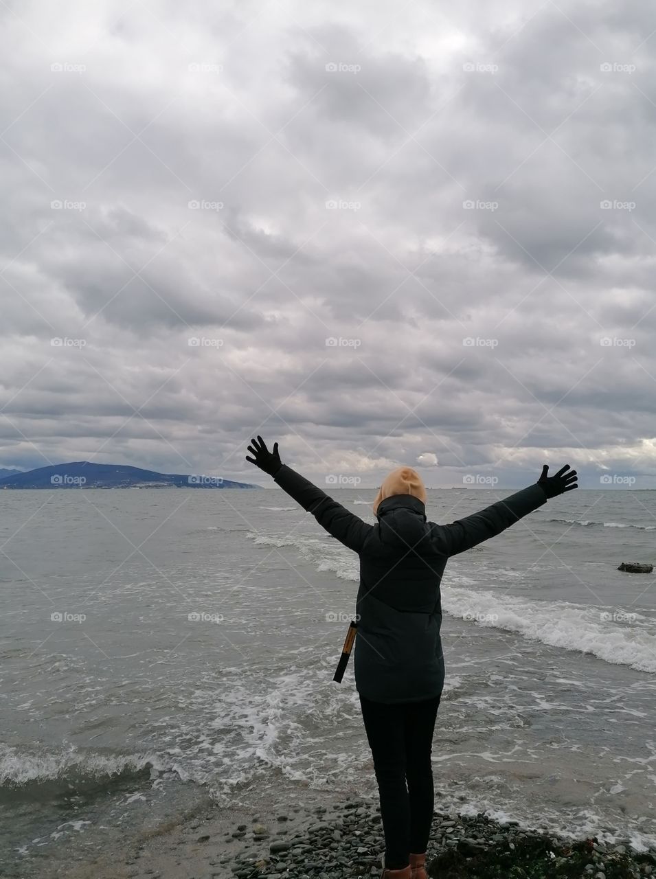 Autumn walk along the Black Sea coast in cloudy weather