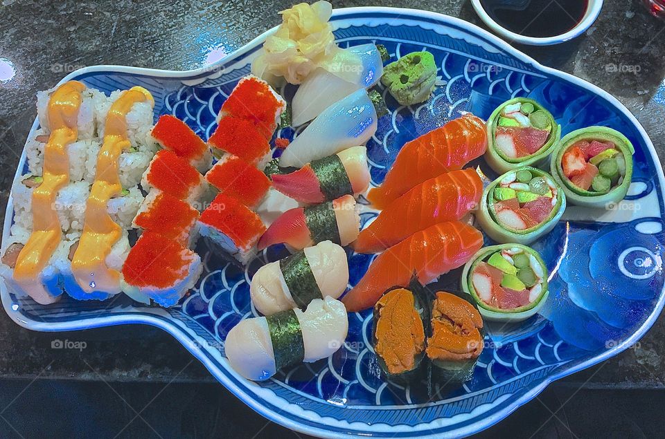 Sushi. Assortment of sushi on fish plate