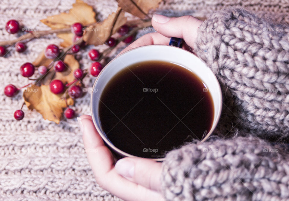 Cup of coffee in hands