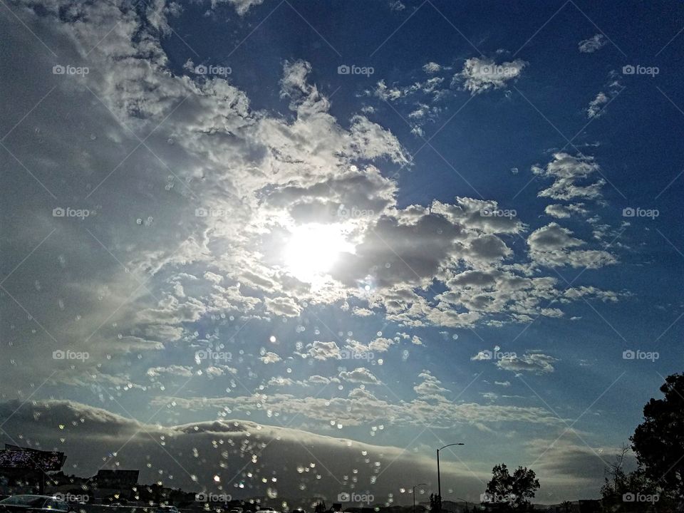 Sun shining on a rain spattered windshield!