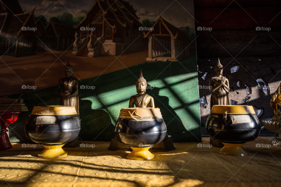 Buddha statue with sunlight 