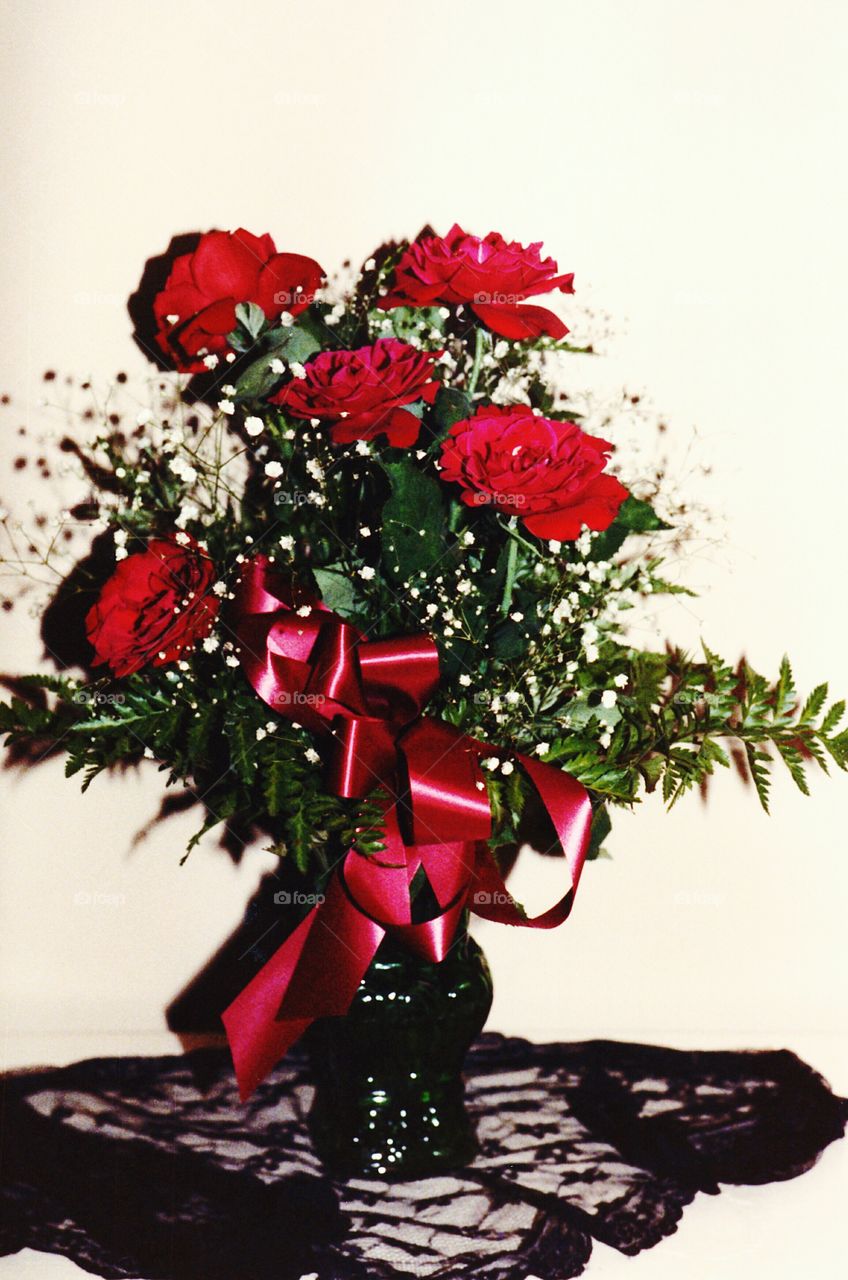 red roses bouquet. red roses and lace bouquet