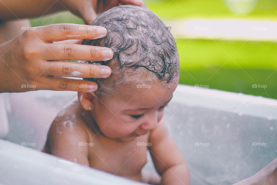 A baby's bath routine