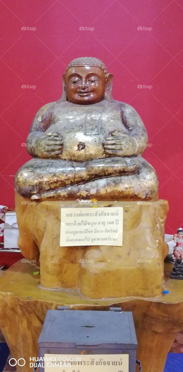 Antique happy Buddha.