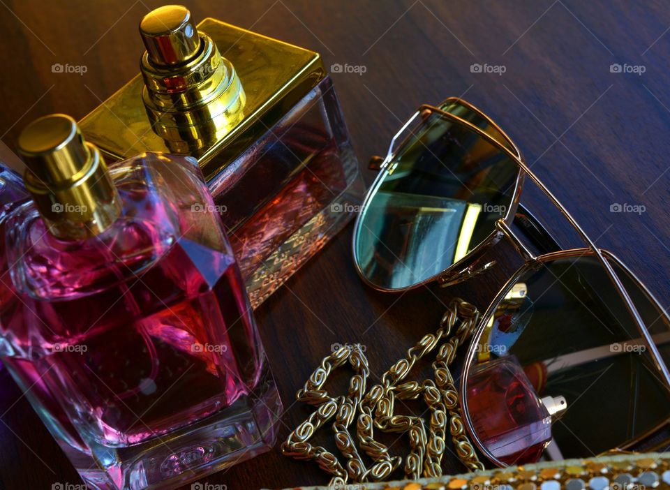 pink fragrance woman accessories and reflection in sunglasses