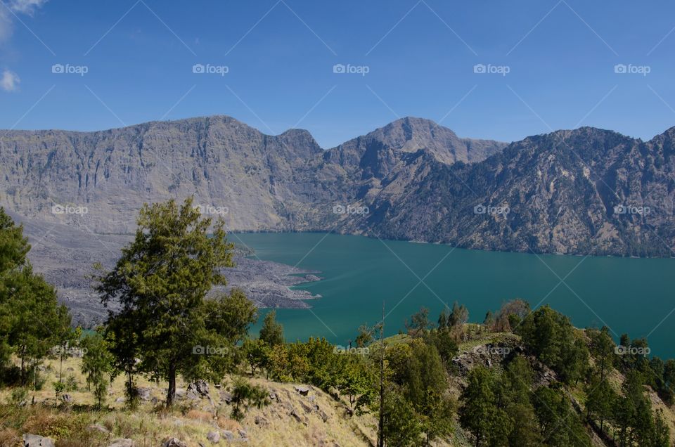 Beautiful nature background at Segara Anak Lake. Mount Rinjani is an active volcano in Lombok, indonesia. Soft focus due to long exposure.