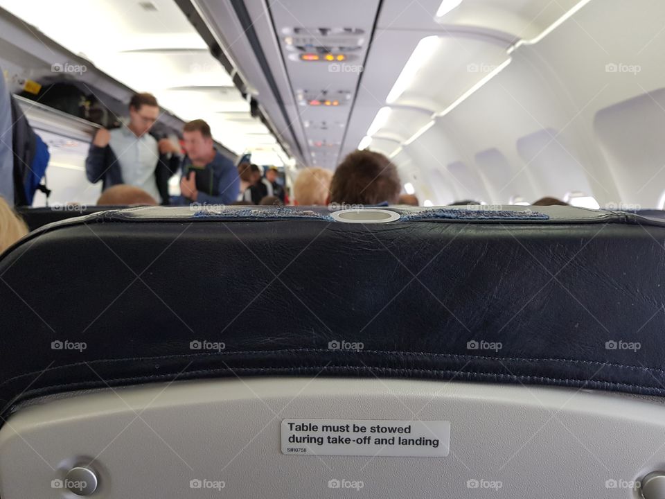 View from a passenger's economy class seat on a British Airways short-haul flight from France to the UK.