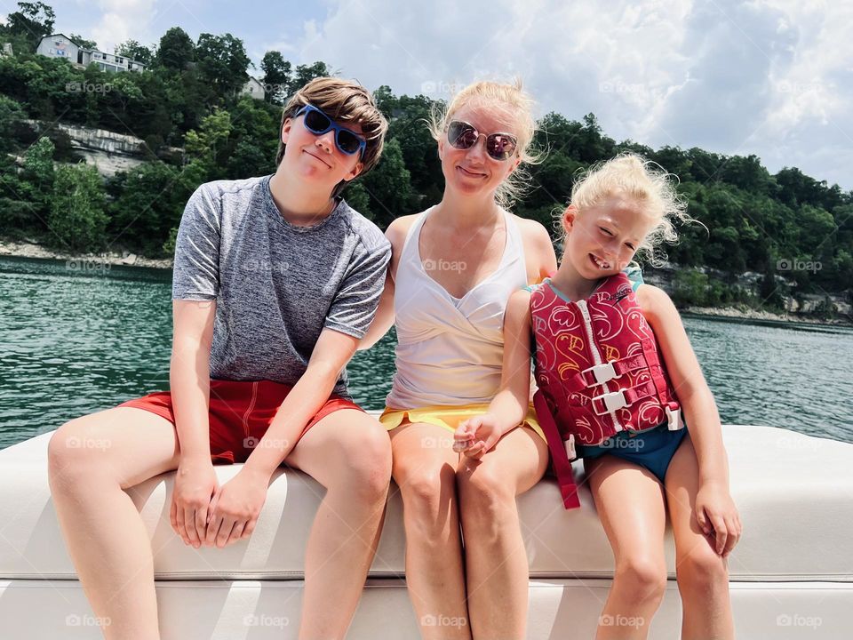 Just a mom and her kids enjoying their happy place on Lake Cumberland in Kentucky, USA 