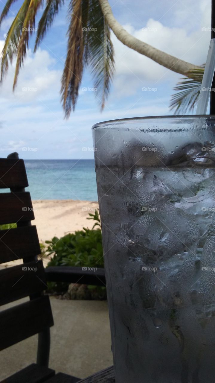 Glass of water at the palms