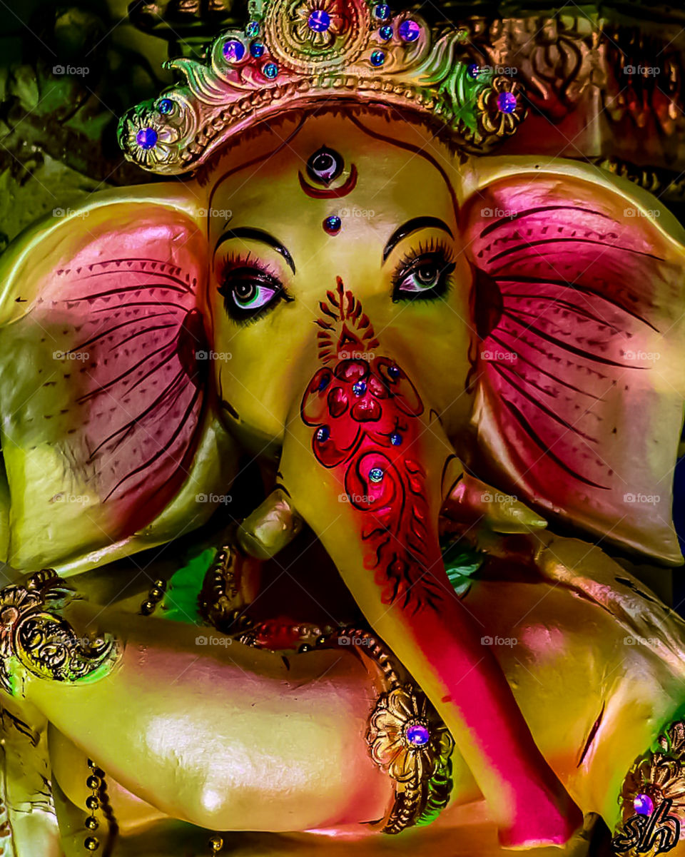 Ganesha is one of the most popular deities in Hindu Mythology and is also known as the The Lord of Beginnings, The Remover of Obstacles and Vakratunda. He is most identified because of Elephant head.