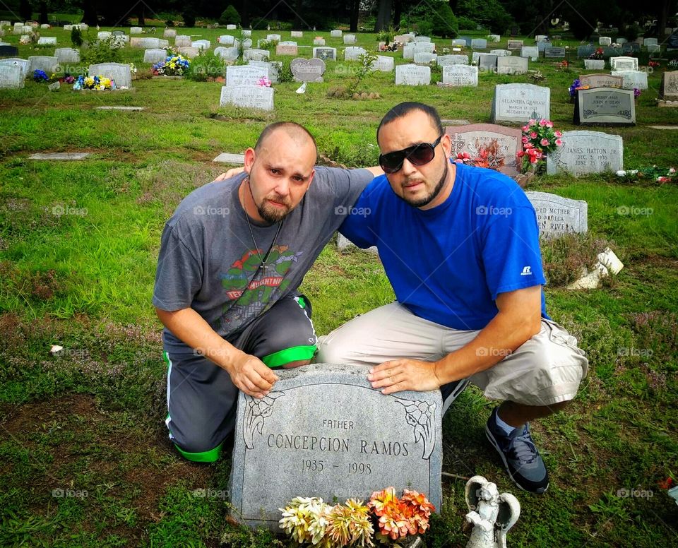 Me and my brother at my dads grave