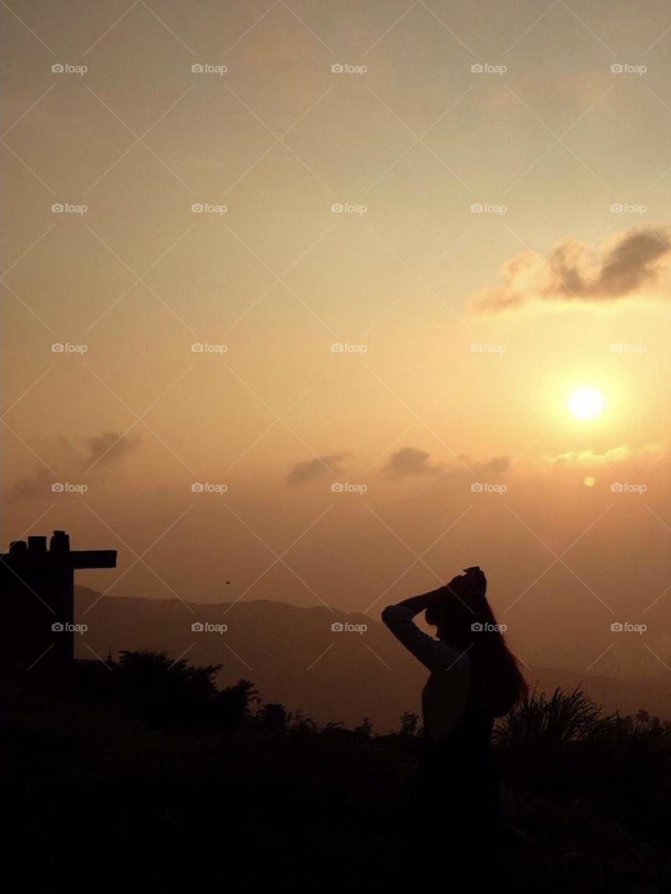 Girl under the goden sunset