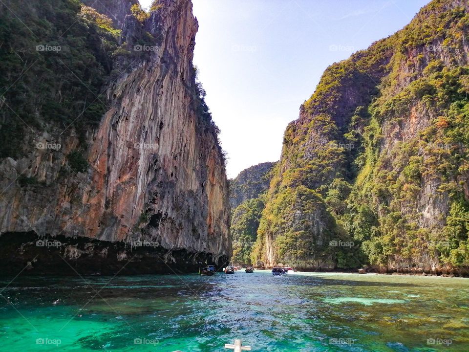 limestone rocks and sea in phi phi lagoon Thailand