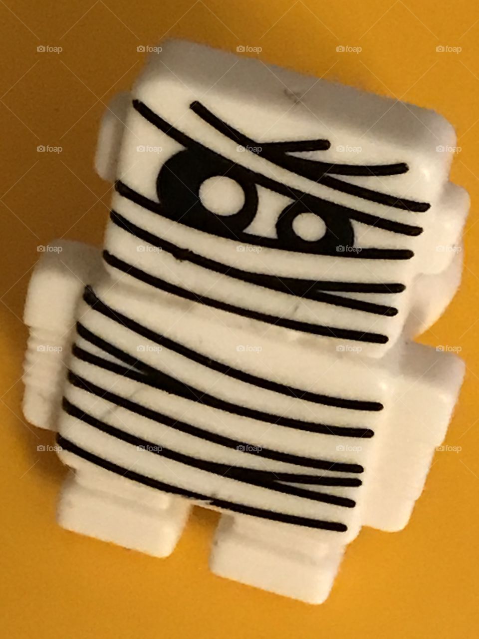 A mini Egyptian mummy. He is a funny, cute sight for sore eyes.