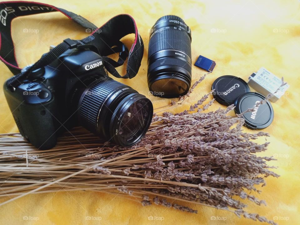 Camera in photography is a device for recording an image of an object on a light-sensitive surface, it is essentially a light-tight box with an aperture to admit light focused onto a sensitized film or plate.