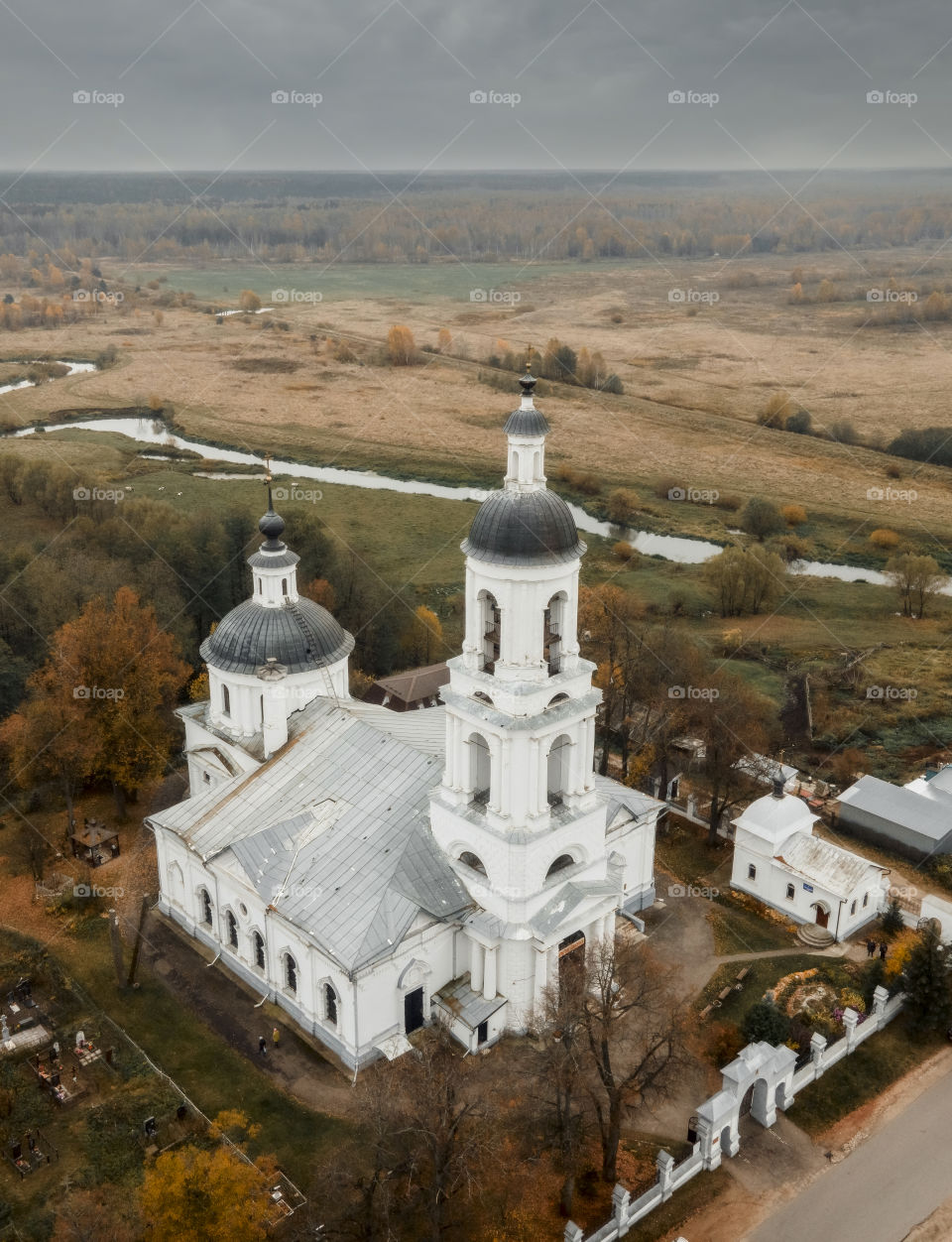 Orthodox Church on a river, autumn aerial landscape, Russia, Vladimir region 