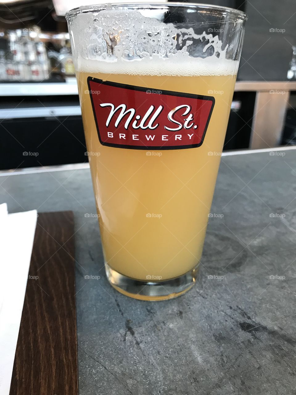 The “head” of a draught beer is a thin layer of foam on top, indicating a good pour. Also, if the head sticks to the glass after a sip this indicates a clean glass. Mill Street Brewery in Toronto got both of these perfect with this delicious IPA.