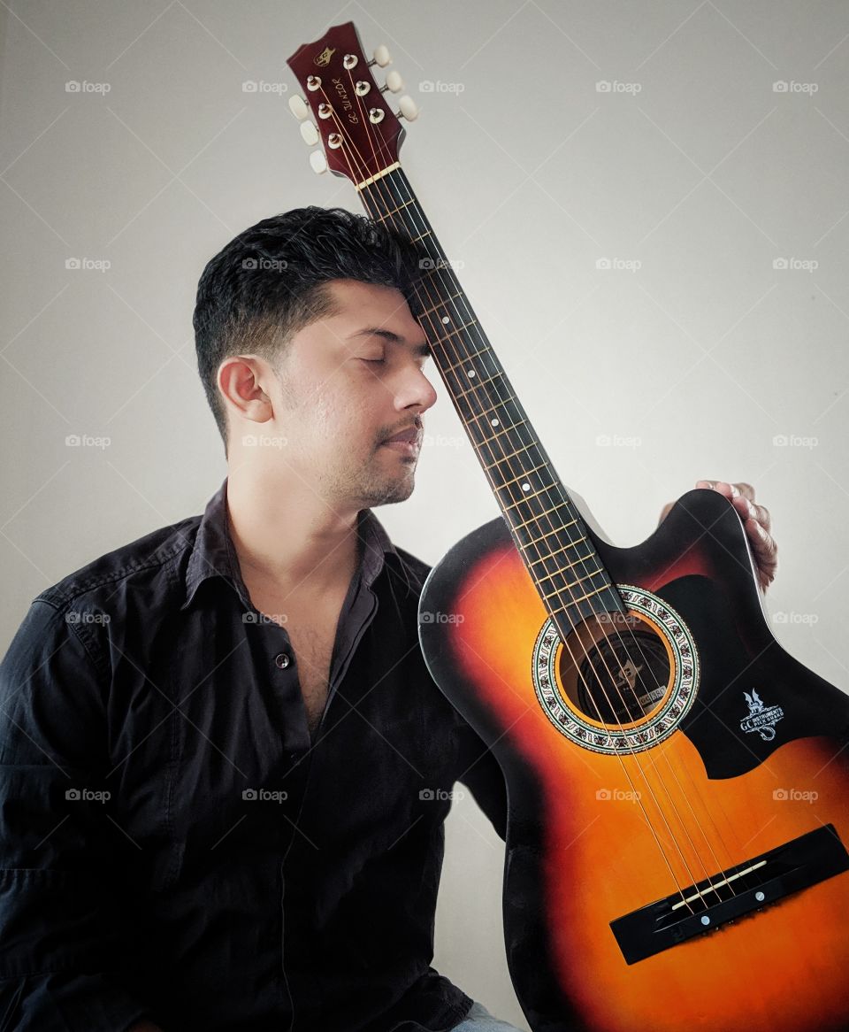 handsome guy with guitar