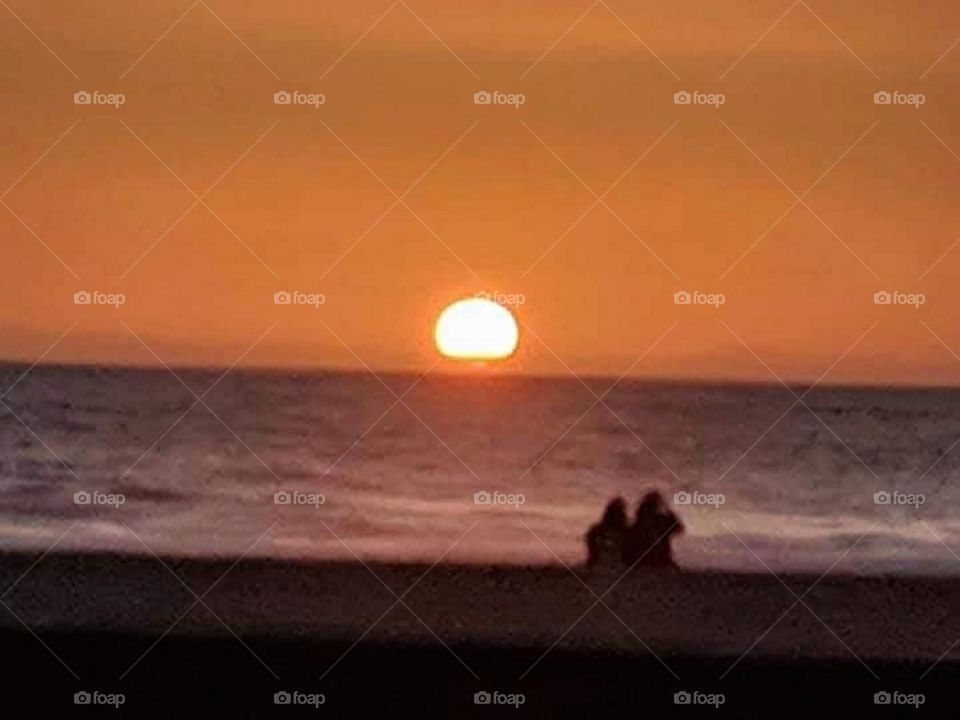 Couple watching the sunset