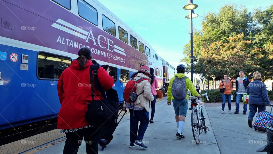 Commuters on the train platform commuting to work.