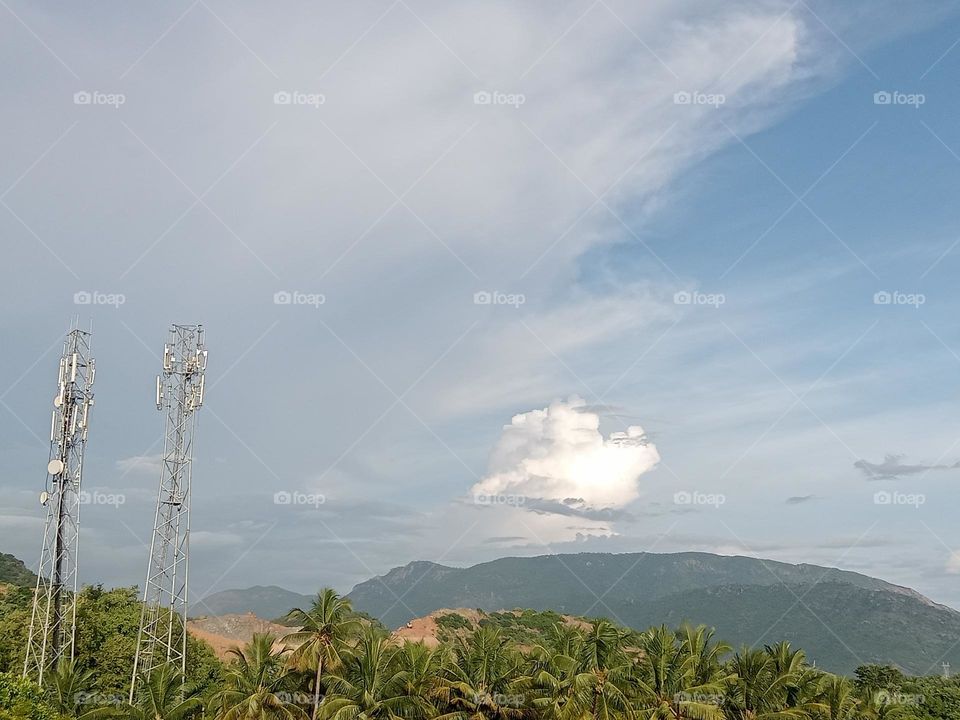 *Ravarma*  Clouds travel,  Amazing white, Sky blue