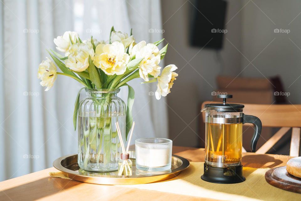 Bouquet of flowers tulips on table at home 