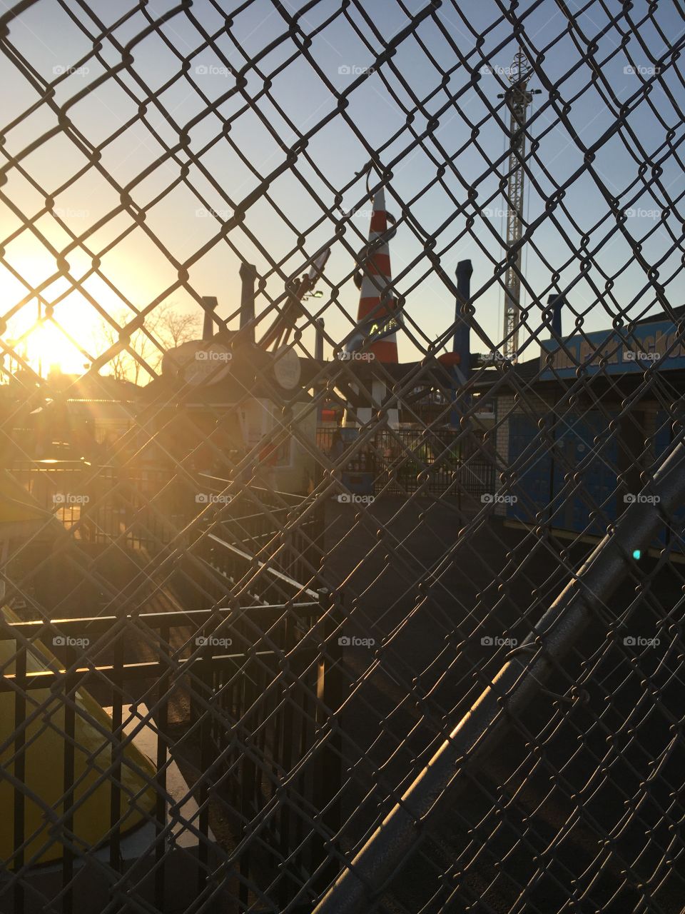 Sunset Through the Fence