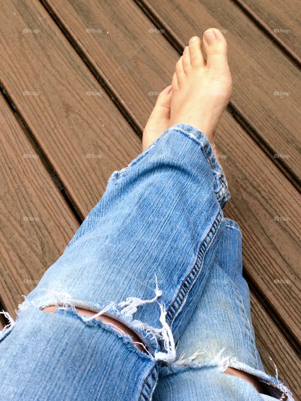 Barefoot and jeans