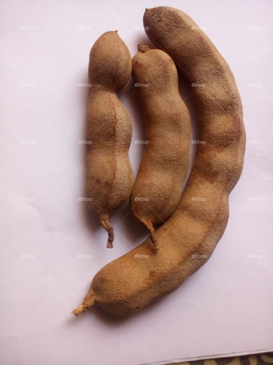 Tamarind  - (Tamarindus indica) is a leguminous tree in the family Fabaceae ... that it is sometimes reported to be indigenous there, where it is known as imli in Hindi-Urdu. 