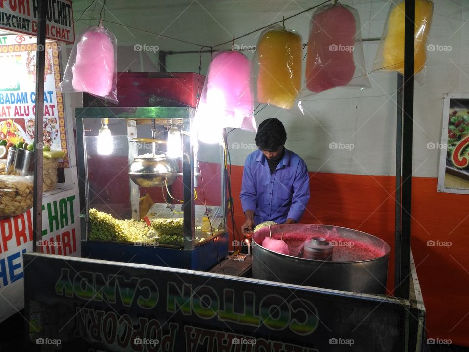Cotton candy and pop corn shop in a local festival
