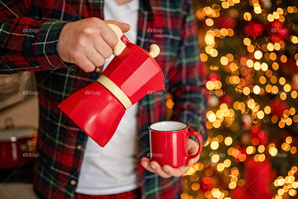 cup of coffee in a cozy festive Christmas atmosphere