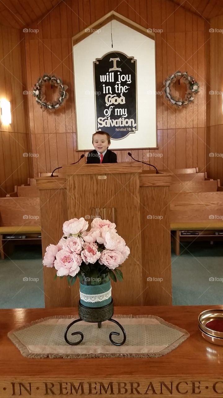 little preacher . bro tries the pulpit