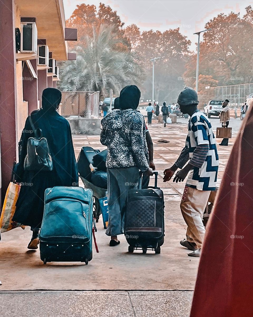 It’s going-home season! Students pack out of Queen Amina hostel in Ahmadu Bello University ahead of the presidential and gubernatorial elections of Nigeria. 