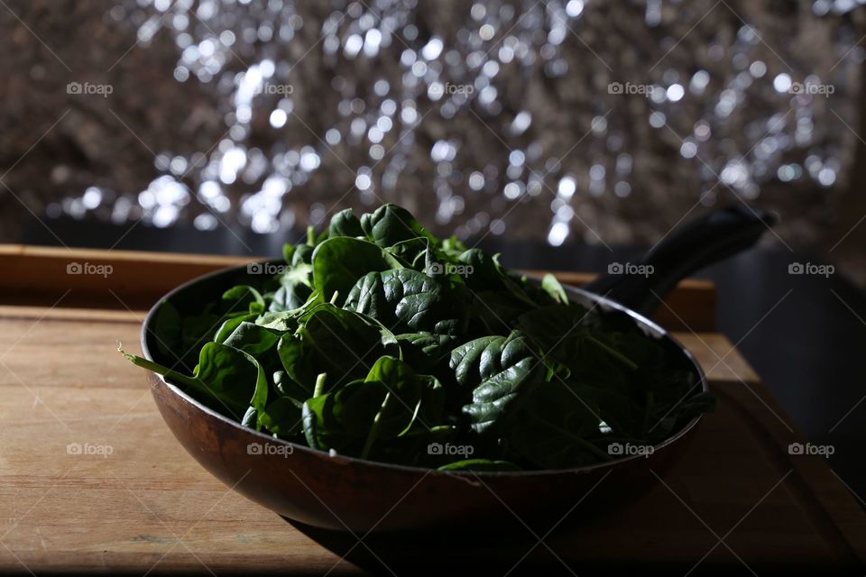 Spinach on frying pan