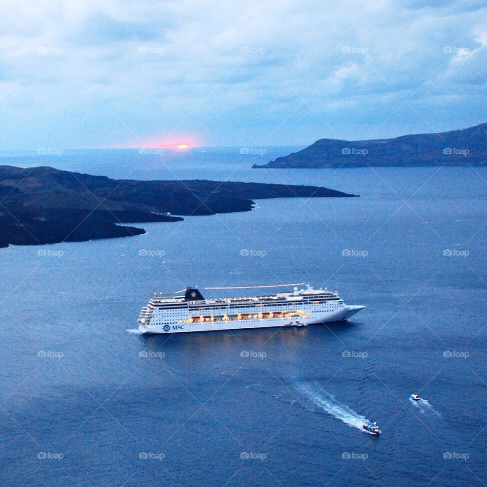 Boat in Santorini harbor