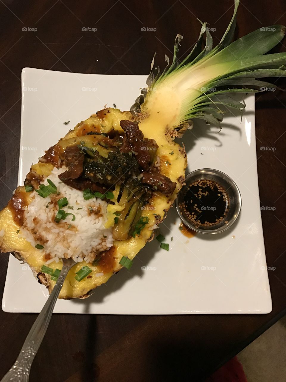 Teriyaki beef in a half pineapple. Dinner. 