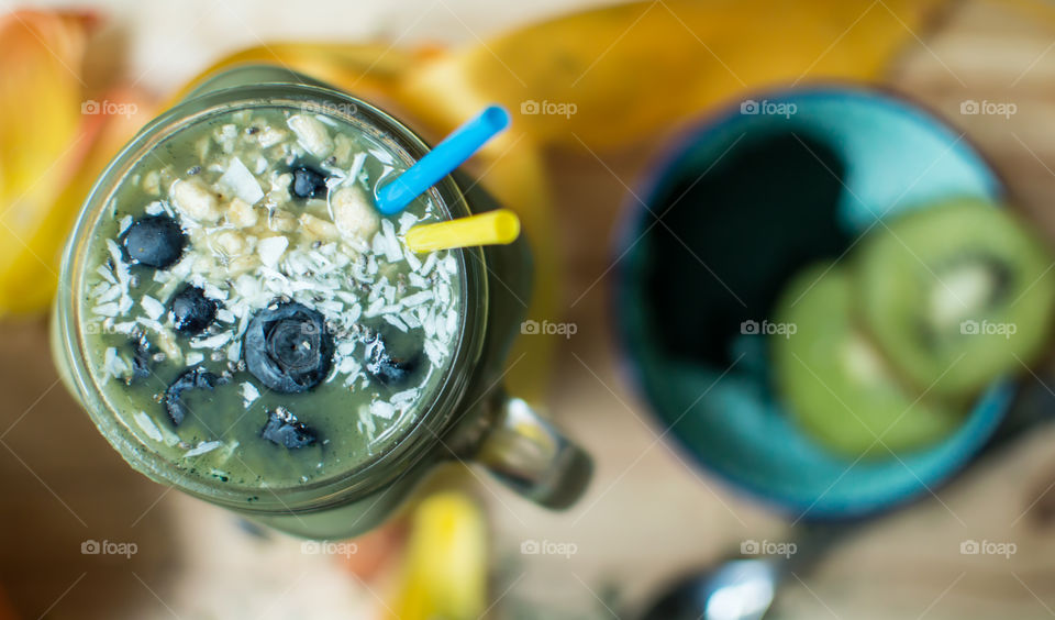 Green fruit smoothie with blueberry