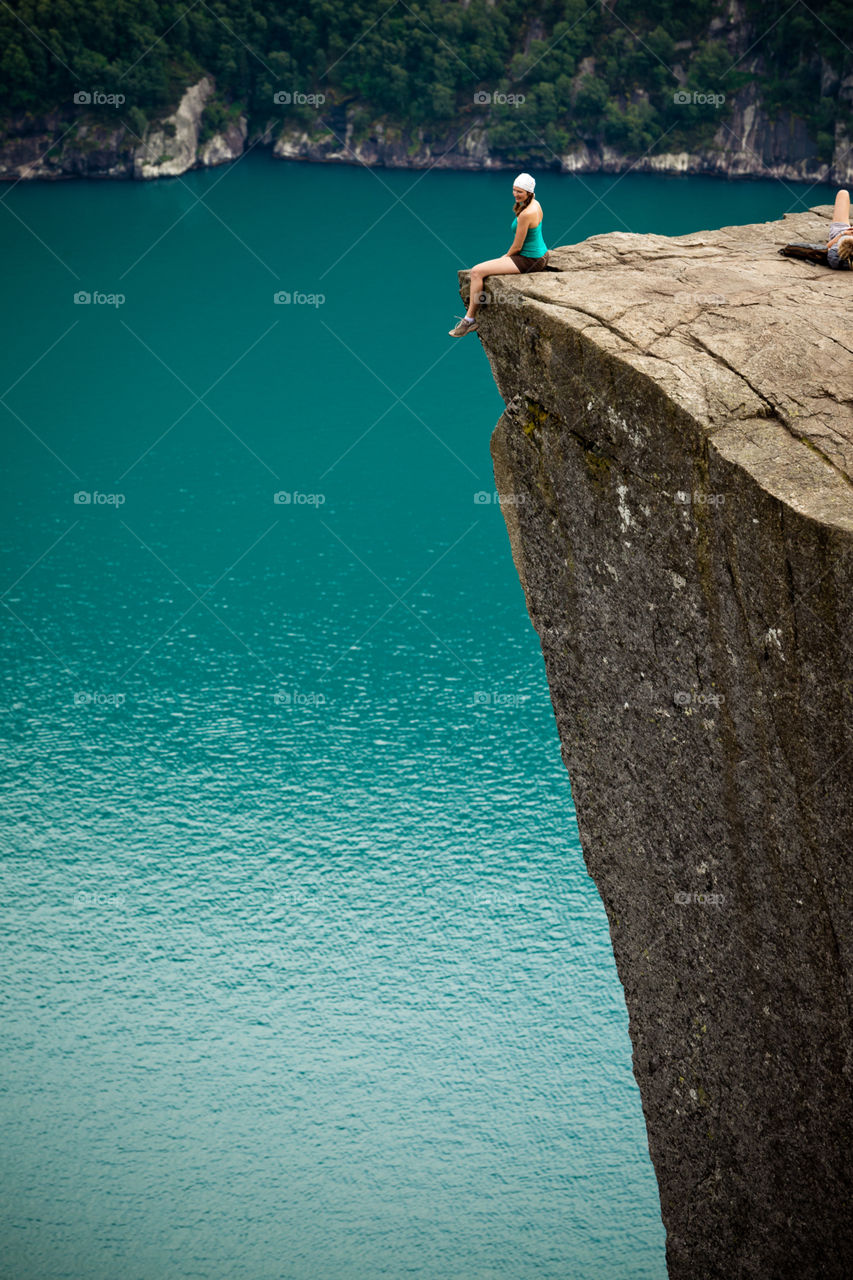 Women sitting on cliff