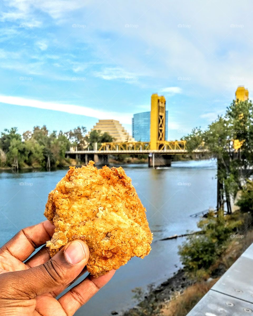 holding food on the riverfront