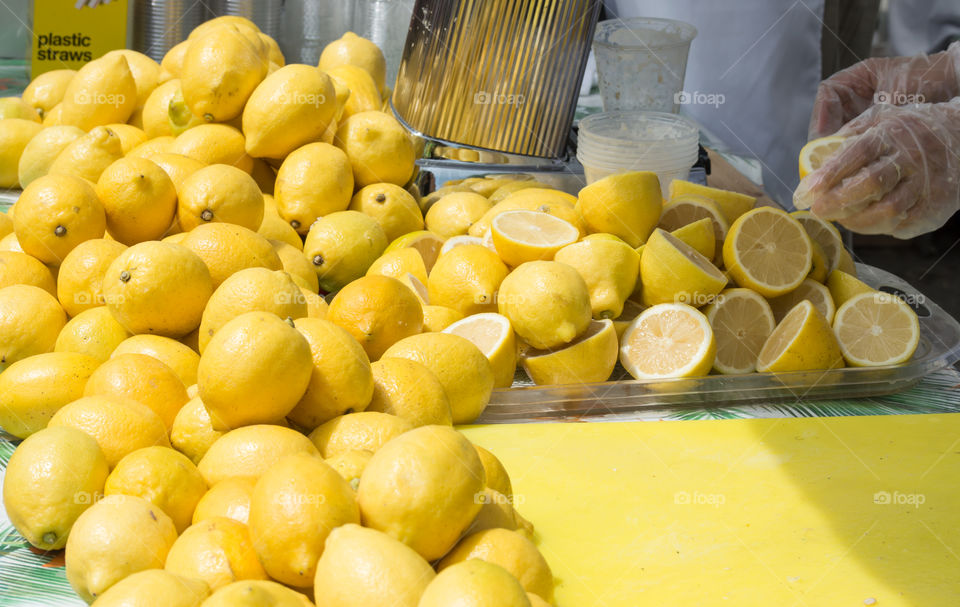 Fresh lemons sliced on table